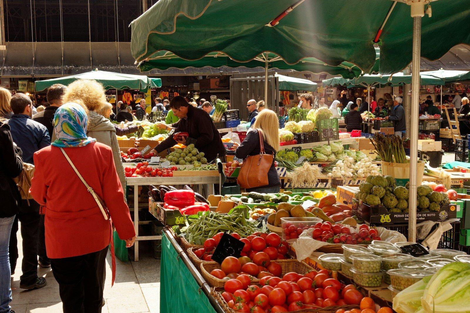 Shoppers La Boqueria market Barcelona